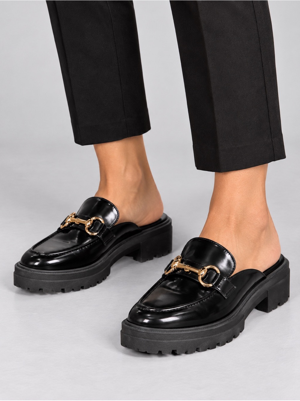 Steve Madden Black Leather Lug-Sole Mule with Gold Horsebit